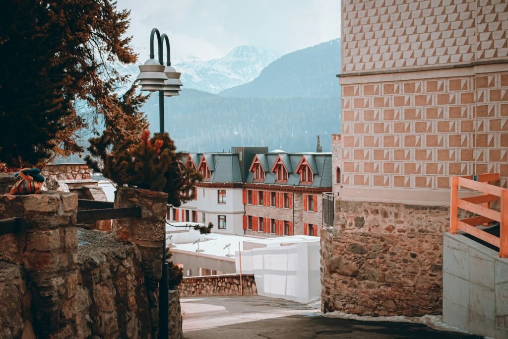 a view of a city with mountains in the background